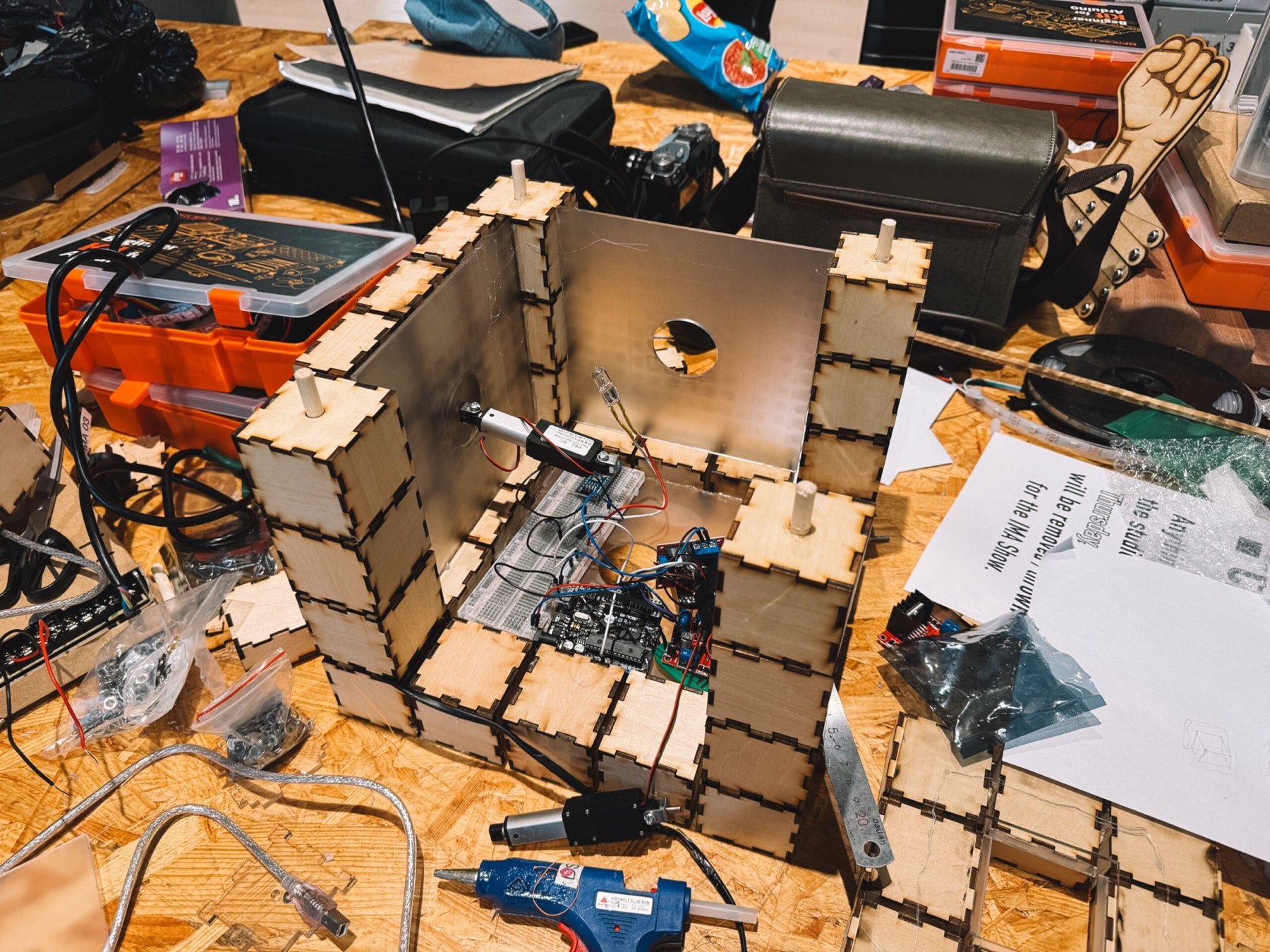 Linear actuator and wiring mounted inside the partially assembled cube core