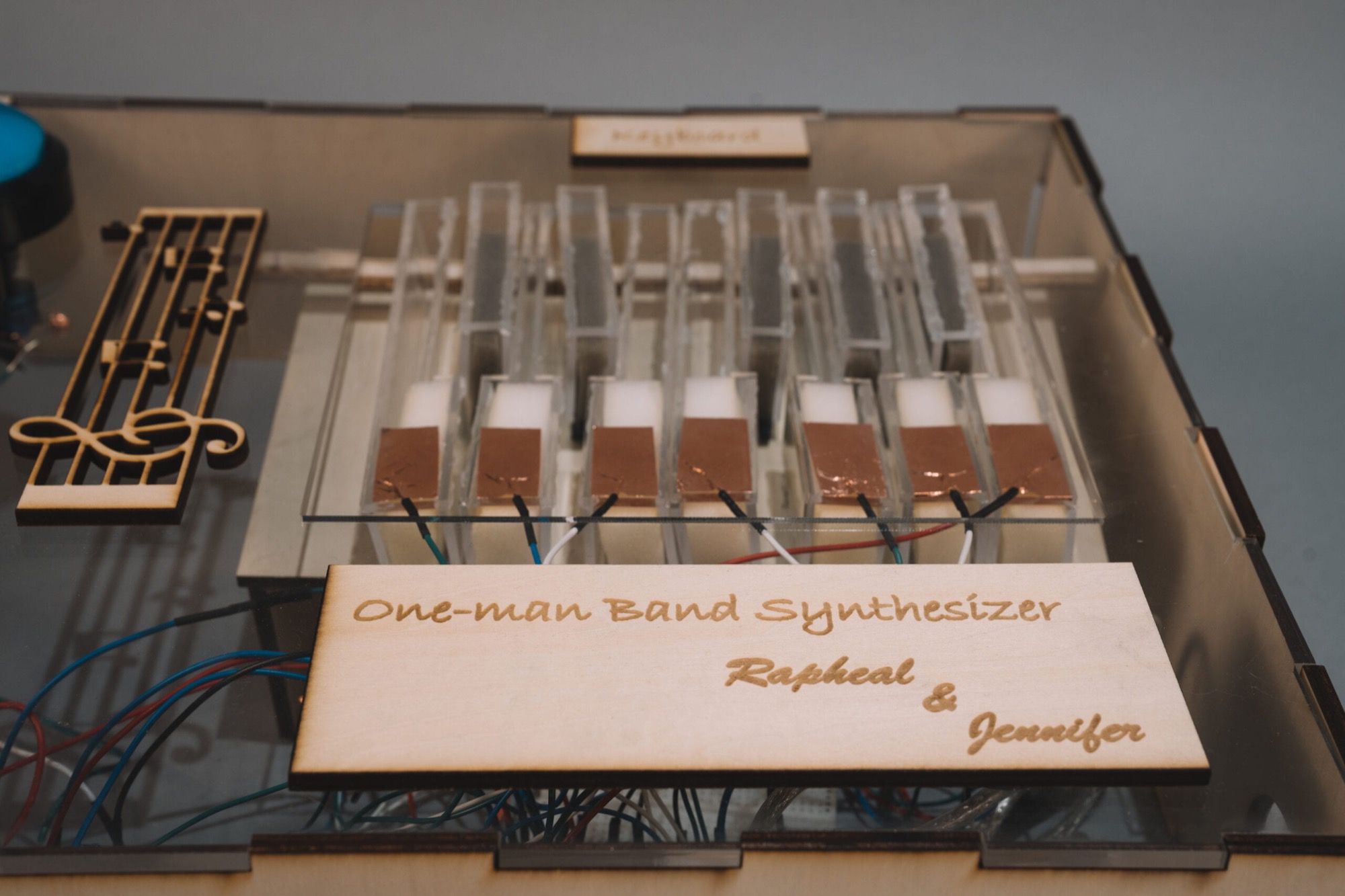 Finished acrylic keyboard with the engraved One-Man Band Synthesizer nameplate
