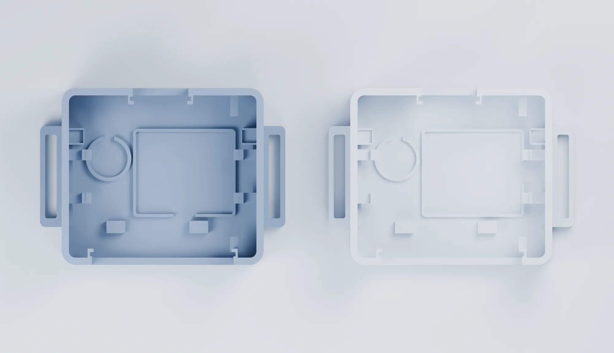Top views comparing the v1.1 battery enclosure and v1.3.2 battery opening